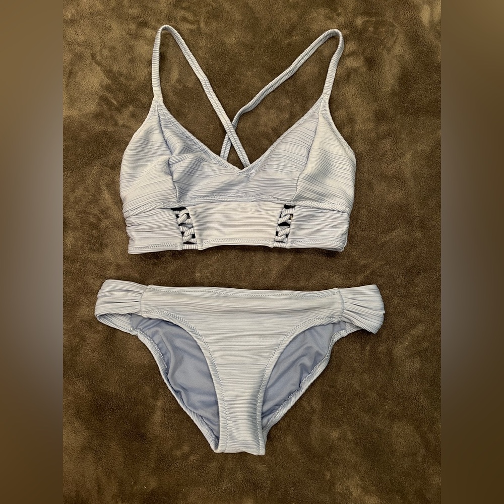 Jessica Simpson, women’s size small swim suit